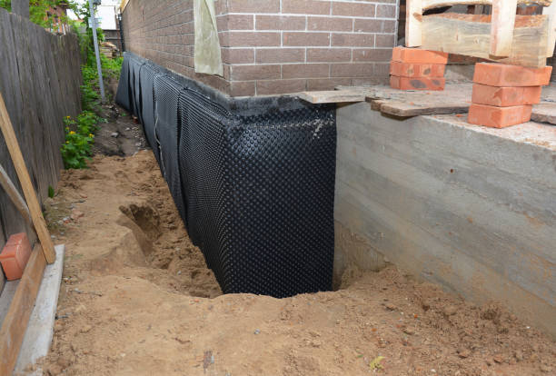 Happy homeowners after waterproofing job in Marne